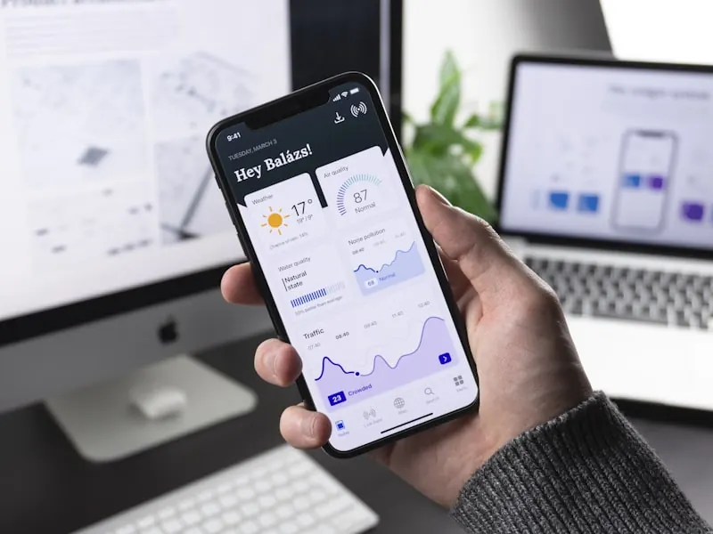 A user interface design being reviewed on a screen